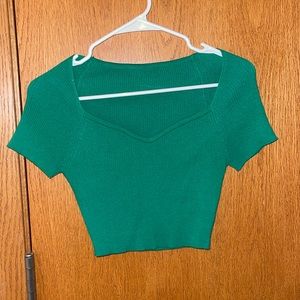 green short sleeve top with flattering cut